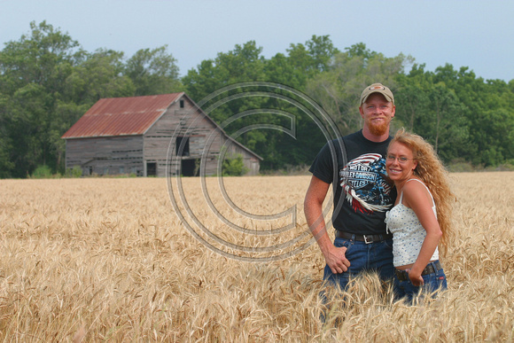 Kansas Couple in Wheat Field